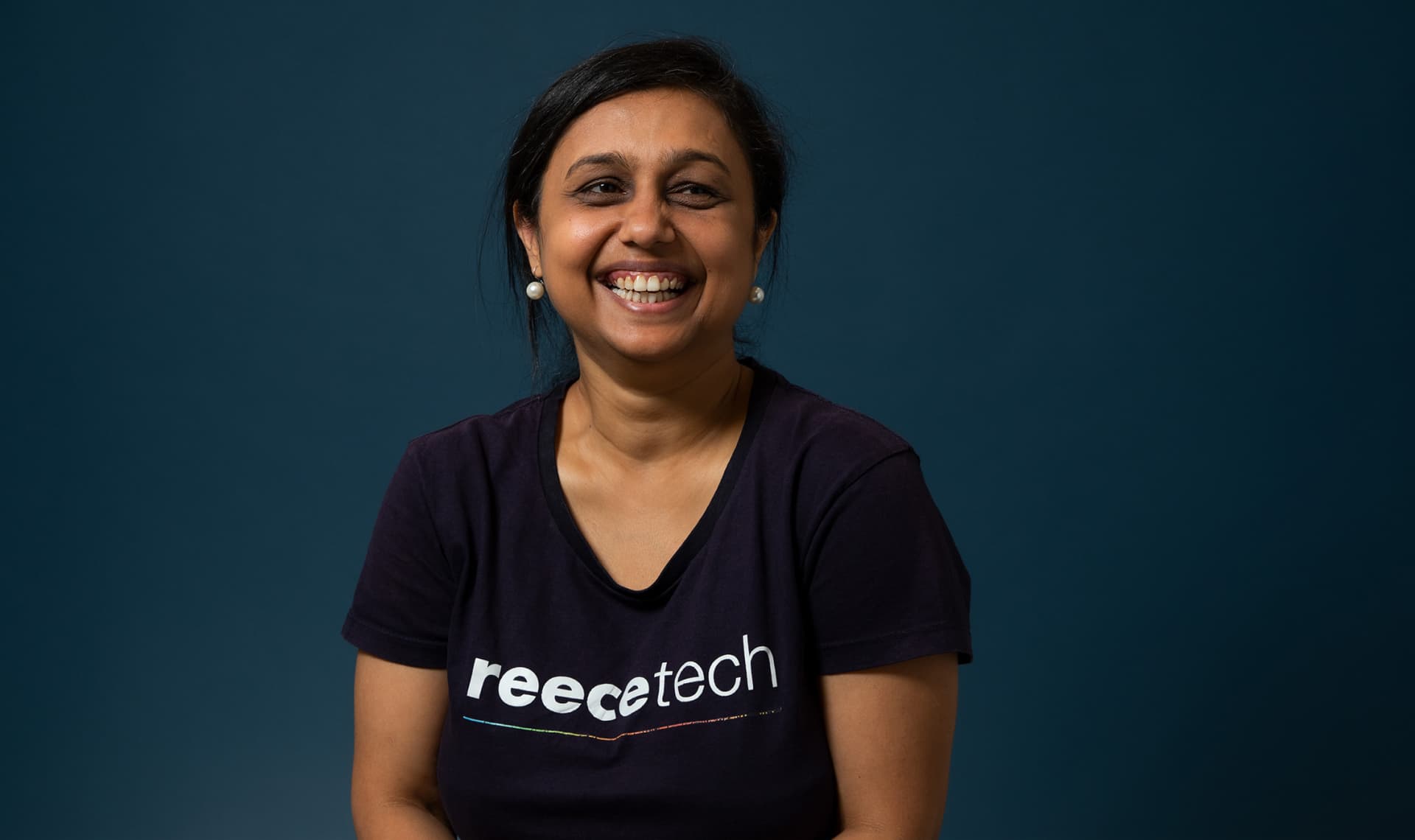 Woman smiling in reecetech t-shirt